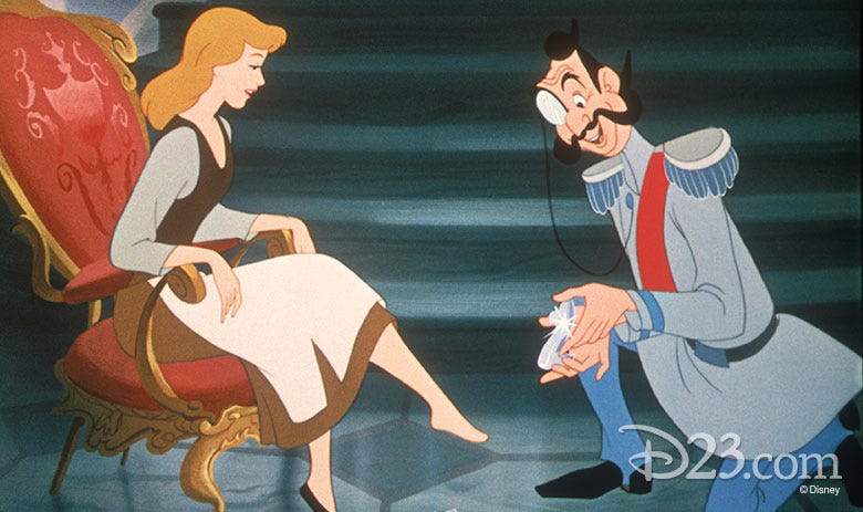 Cinderella putting on the glass slipper Cinderella putting on the glass slipper