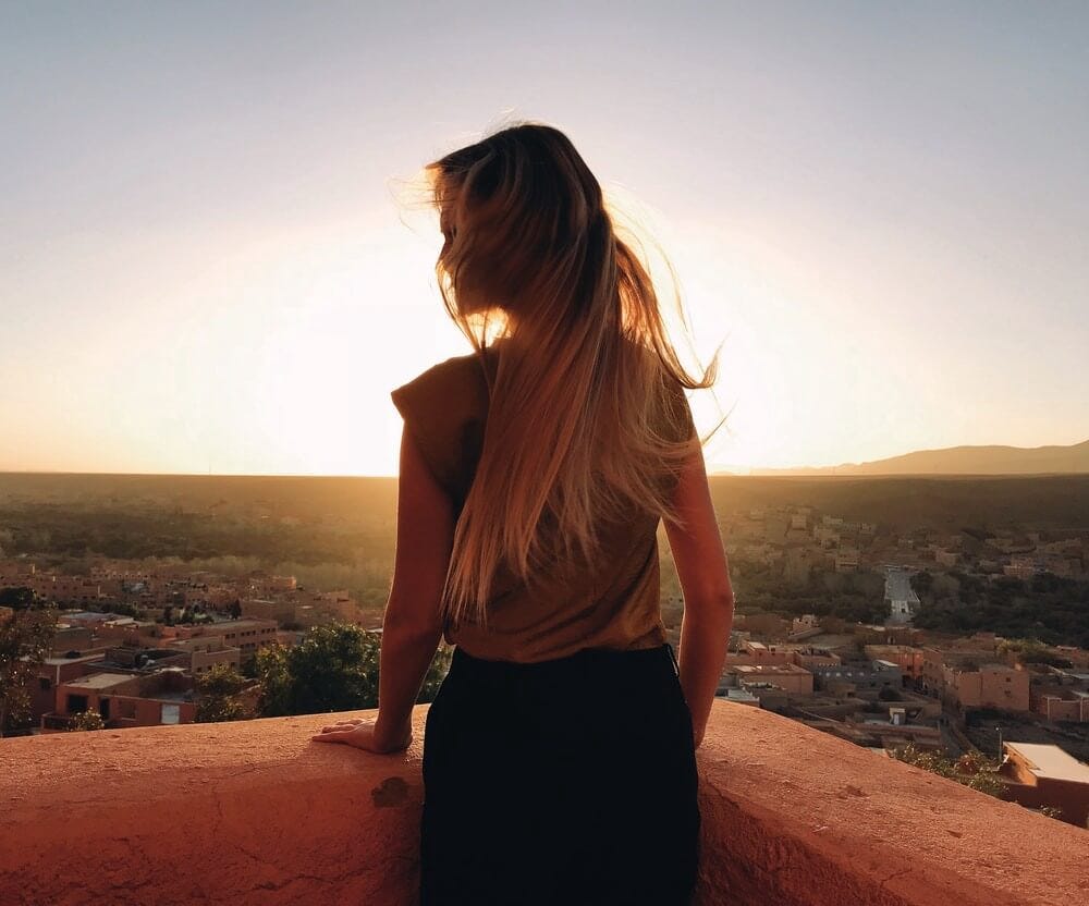 beautiful girl, a muse, looking into the sunset