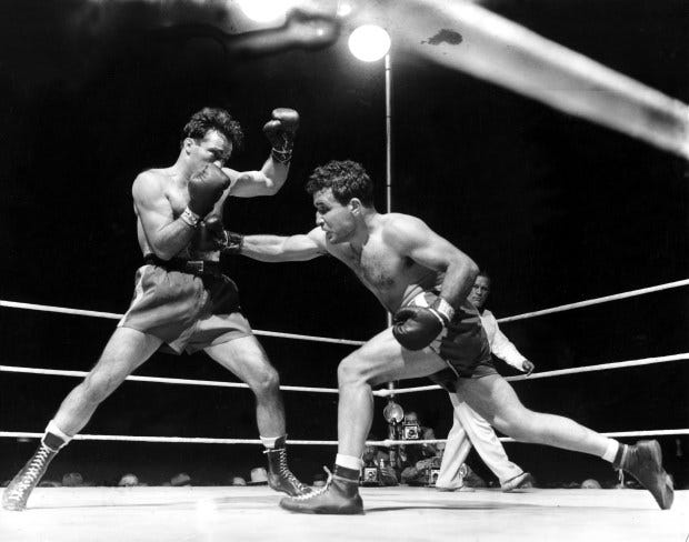 This June 16, 1949, file photo, shows Jake LaMotta, right,... This June 16, 1949, file photo, shows Jake LaMotta, right,...