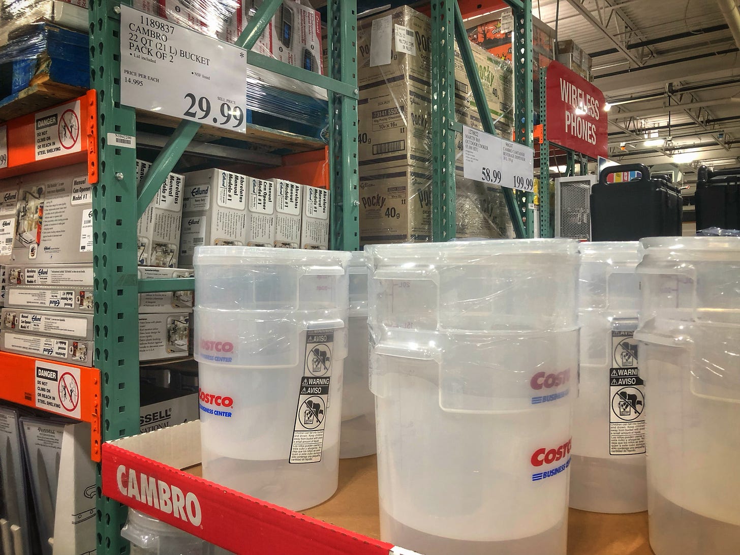 A display of 2-packs of 22-quart Cambro and Costco-co-branded foodservice buckets for $29.99