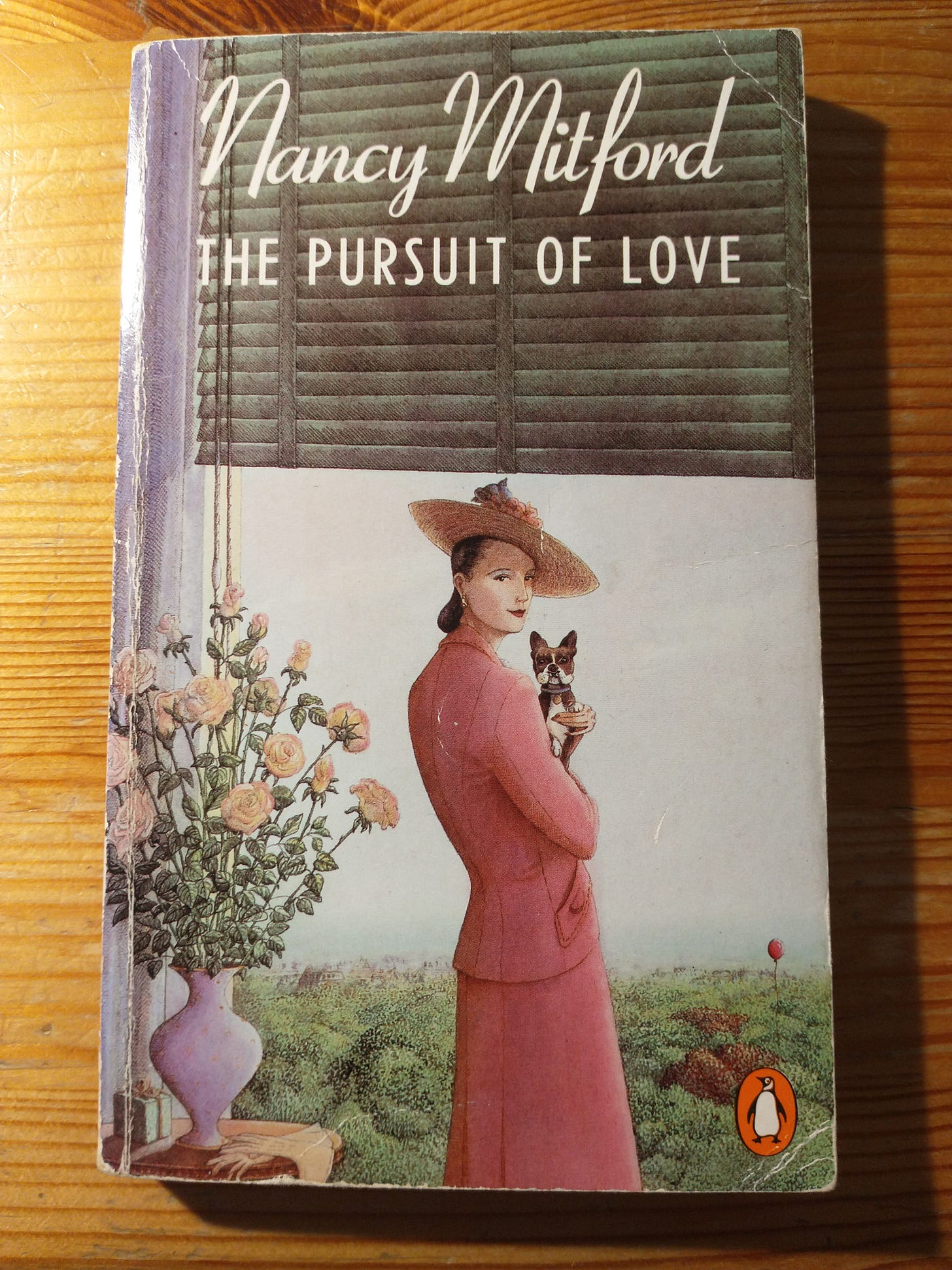 Paperback copy of The Pursuit of Love