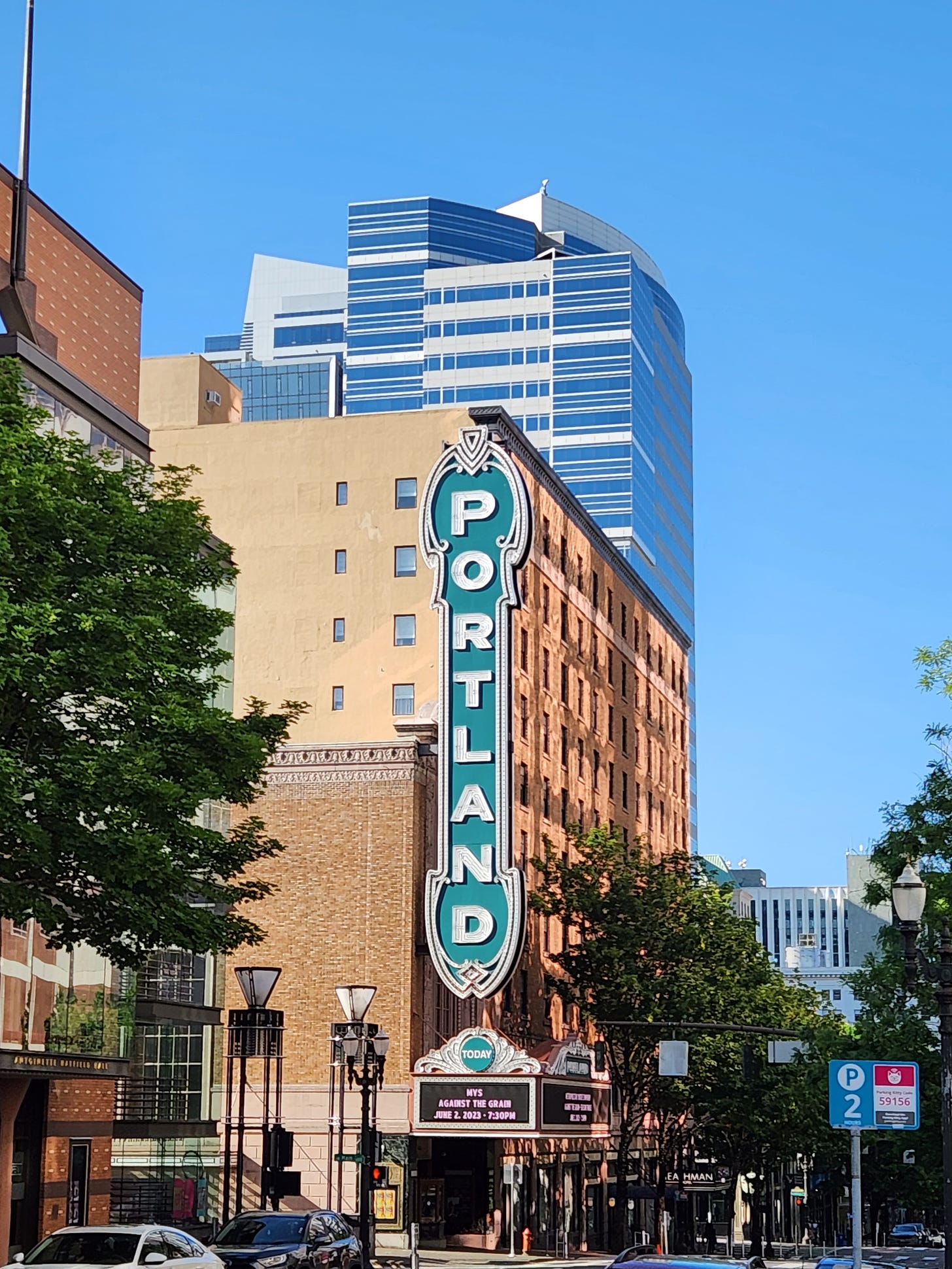vertical portland sign with skyscrapers