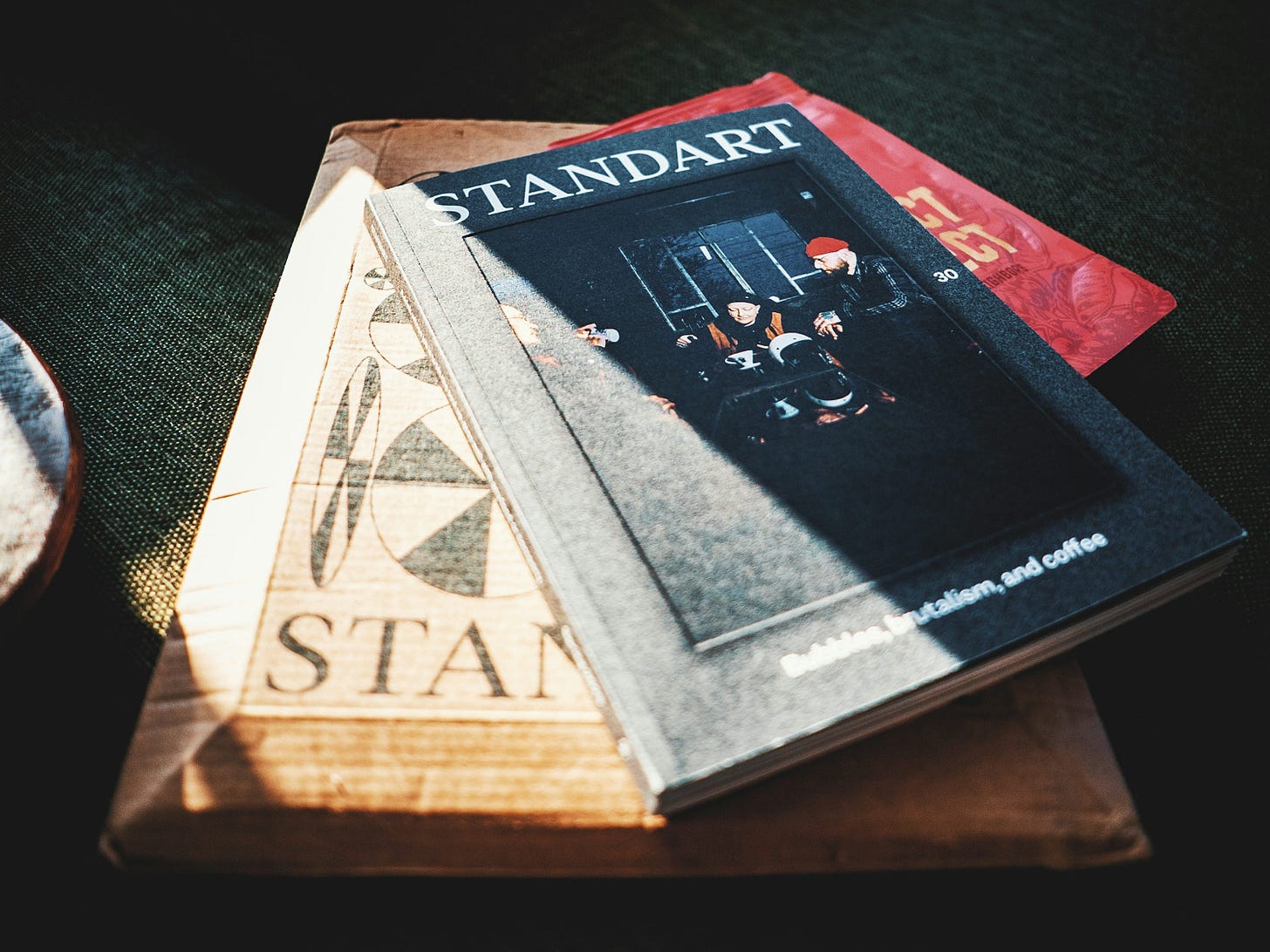 a stack of books sitting on top of a table