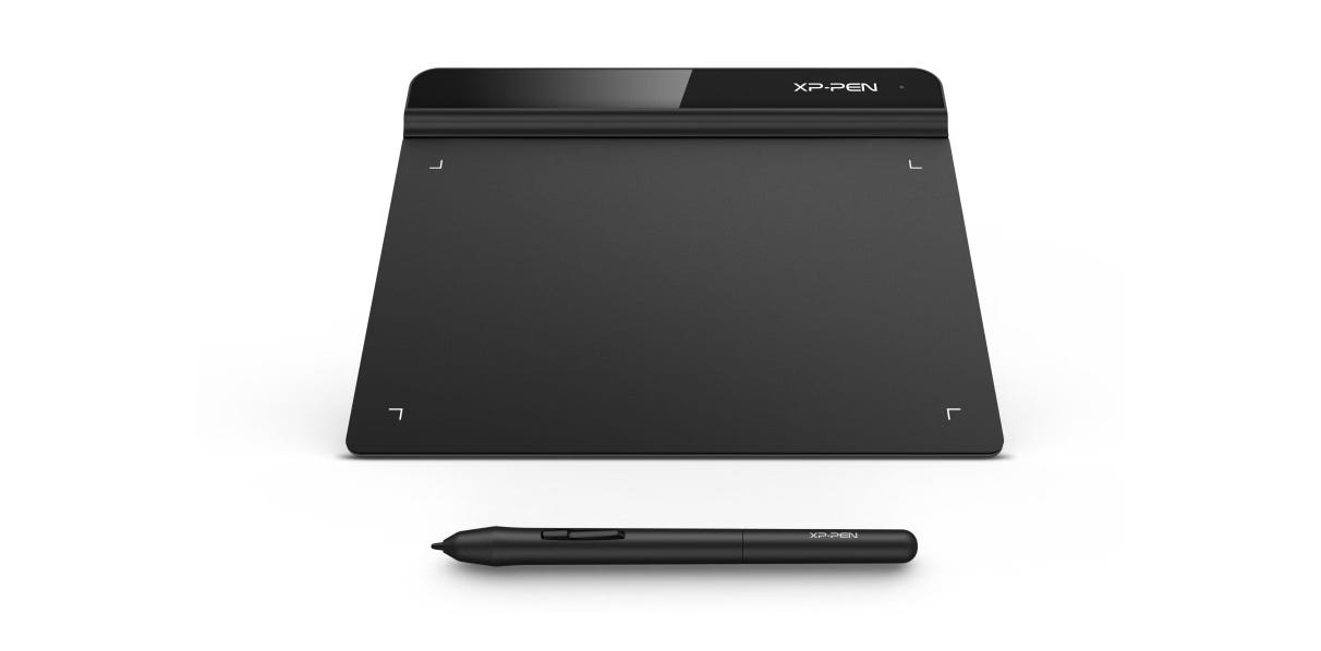 A black computer graphics tablet on a white background, with a black stylus in front of it.