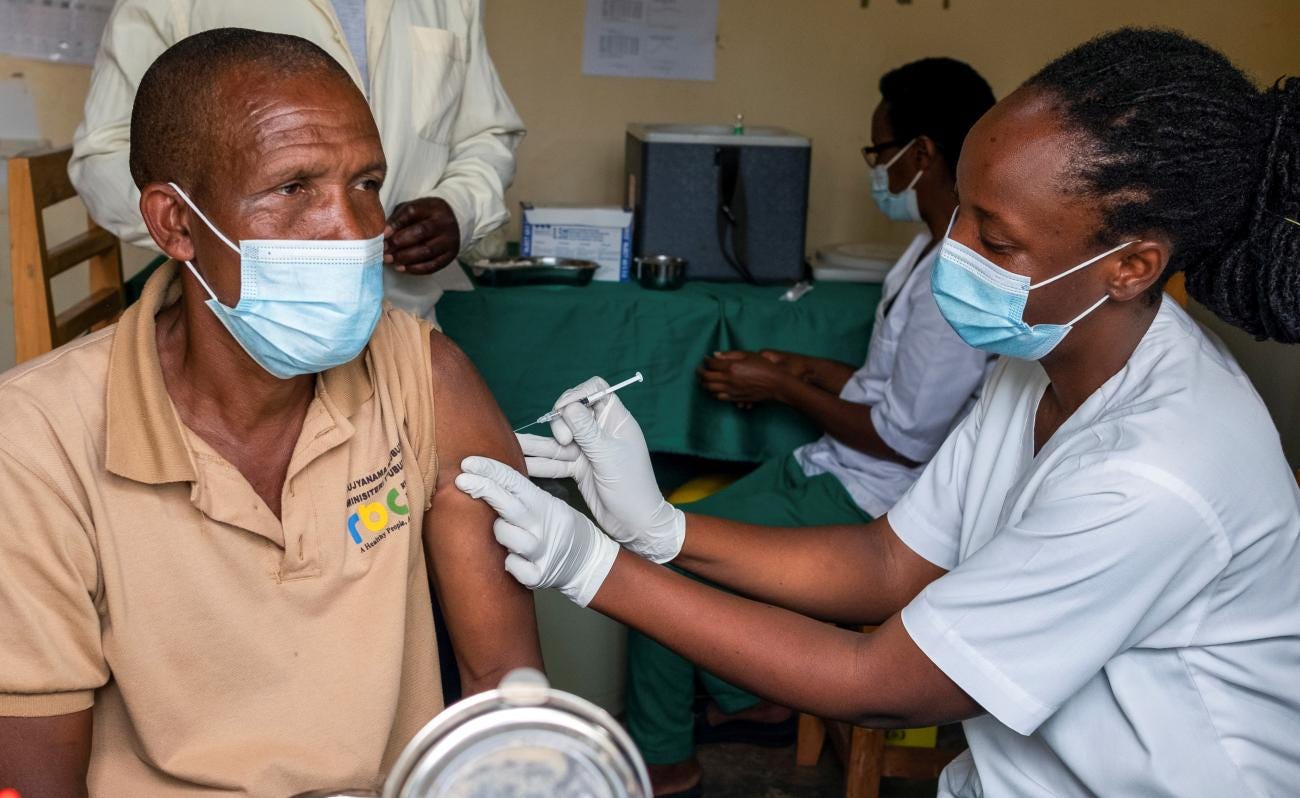 A man receives a vaccine against the coronavirus disease (COVID-19) at the Masaka hospital in Kigali, Rwanda, on March 5, 2021.