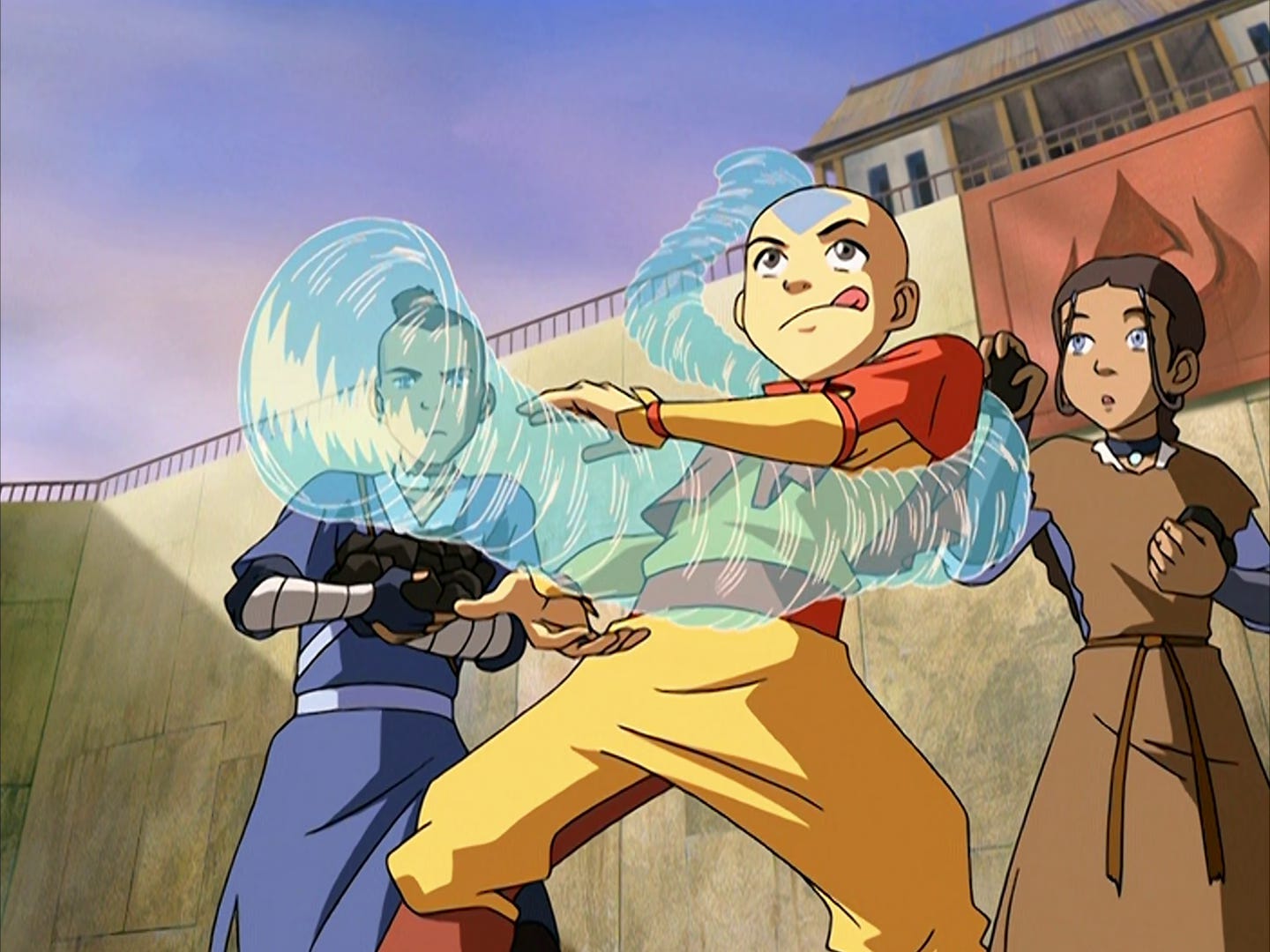 Aang holds a swirling funnel of air like a missile launcher while Sokka and Katara reach to drop coal into it.