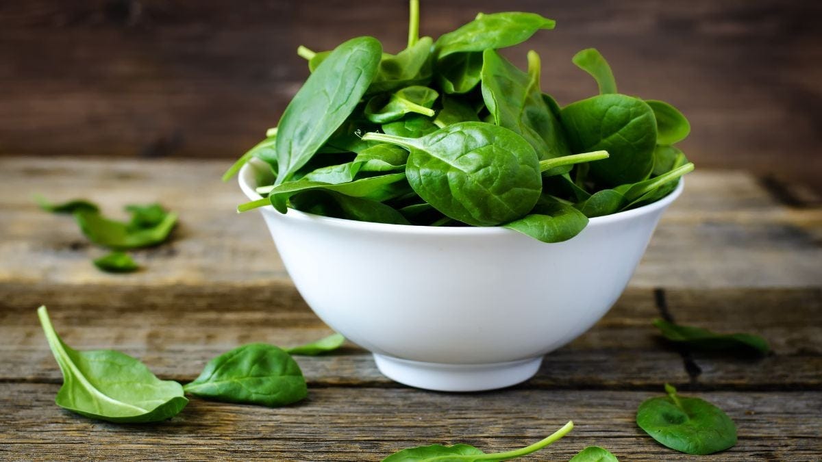 Spinach in white bowl