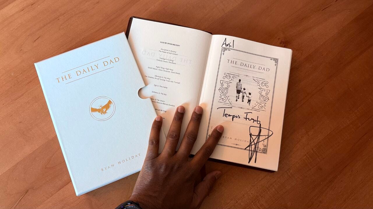 A handwritten note and an autograph from Ryan Holiday himself
