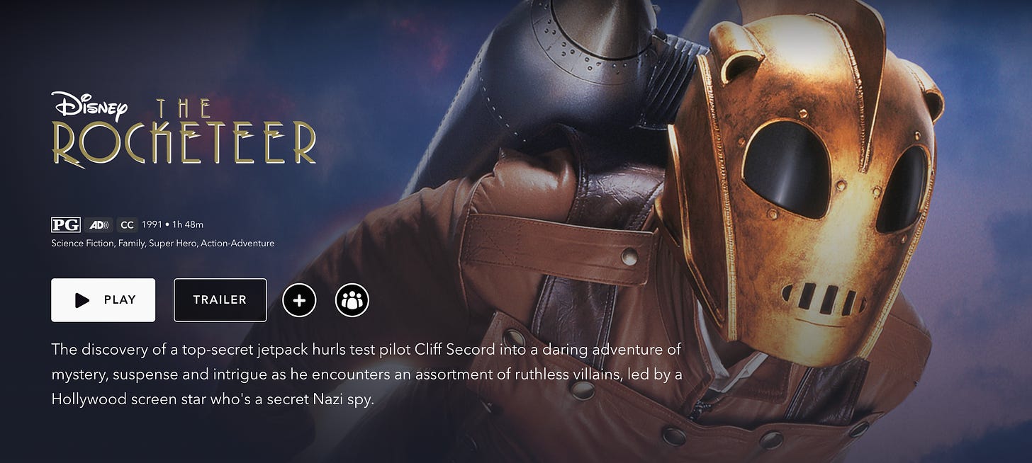 A screencap of the Disney+ title screen for the Rocketeer showing a man in a helmet with a jetpack flying towards the viewer