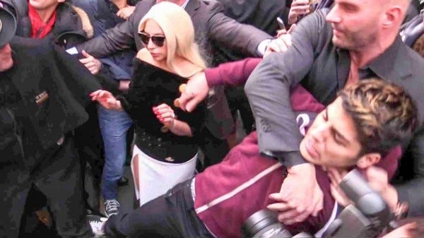 lady gaga bodyguard chokes fan 2015