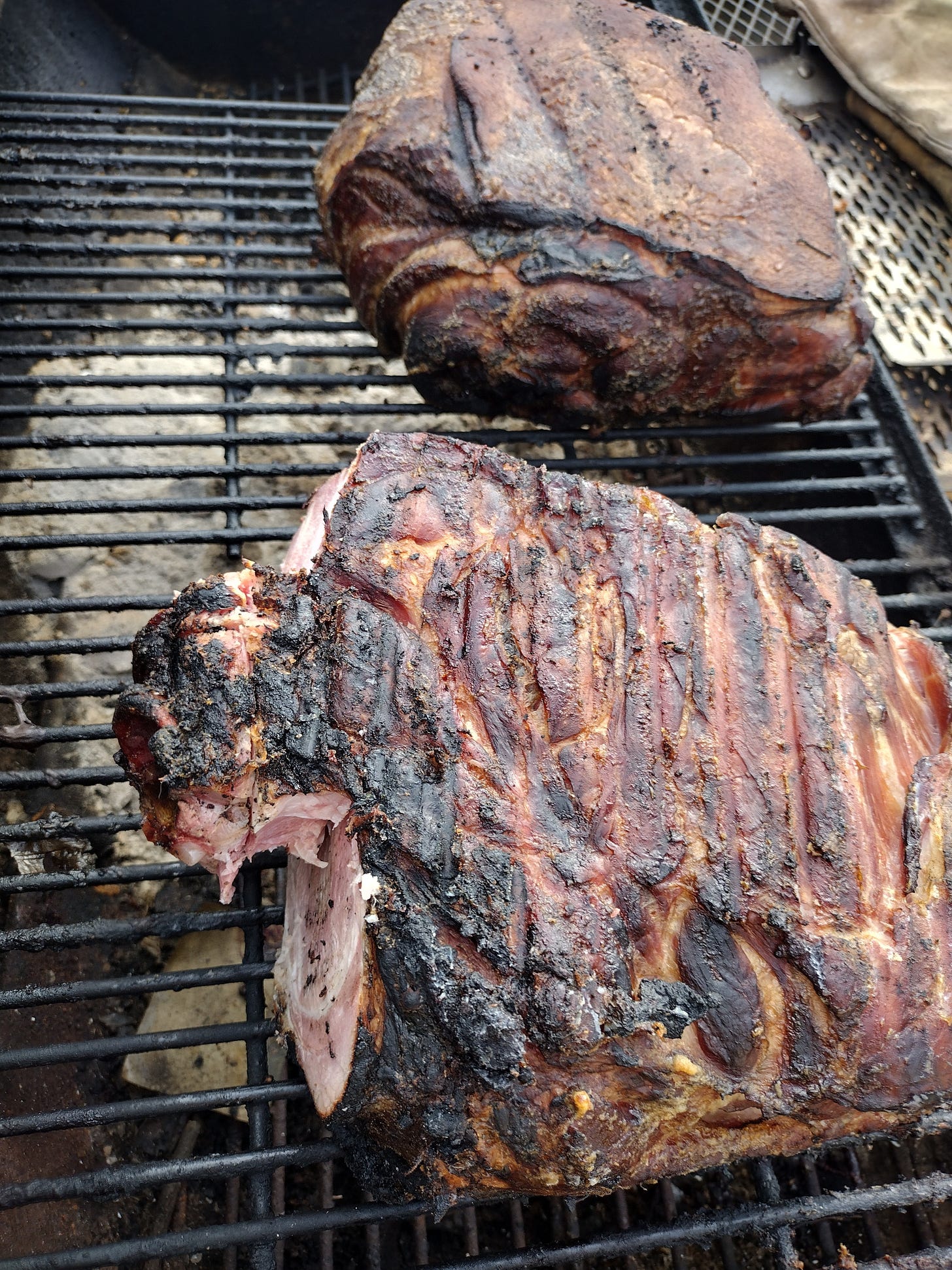 Two eight-pound hams, right on the smoker.