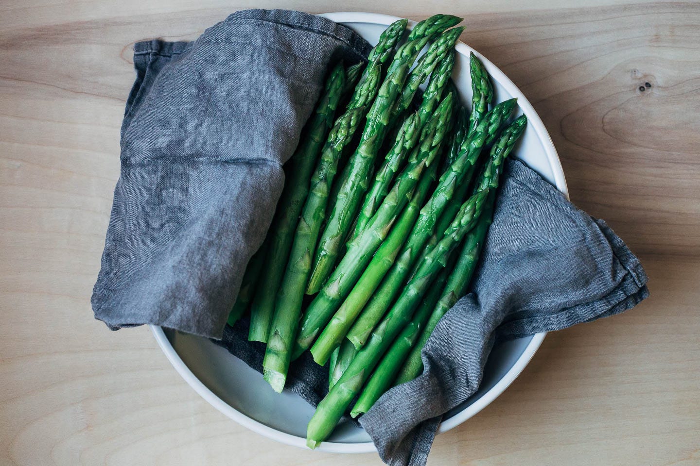 Cooked asparagus in a bowl