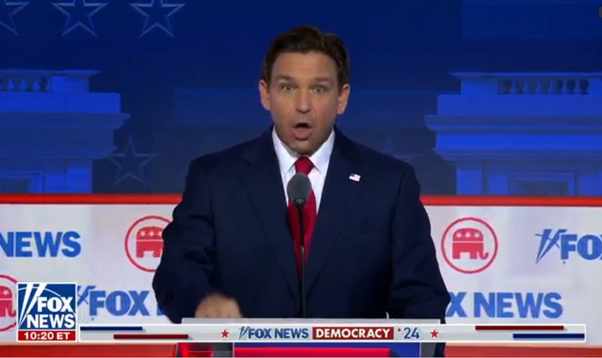 Ron DeSantis looking stupid and pounding lectern at first GOP primary debate