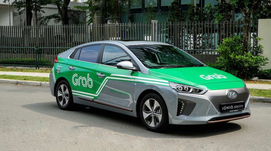 Booking.com launches ride-hailing service with Grab tie-up