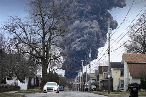 Crews release toxic chemicals from derailed tankers in Ohio - Action ...