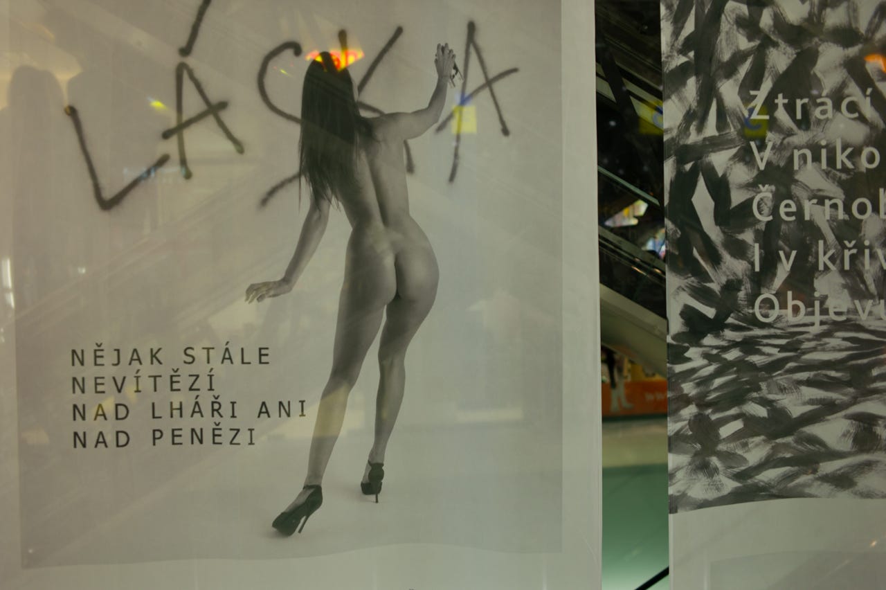 A poster with a naked person on it

Description automatically generated