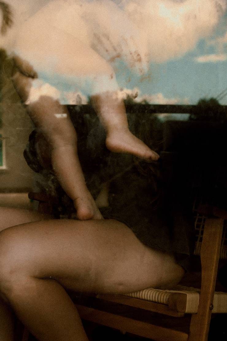 Dreamy, ethereal portraits of motherhood, taken during quarantine through glass by Australian artist Lisa Sorgini (lisasorgini.com).