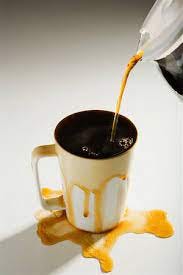 Coffee cup spilling Stock Photos - Page 1 : Masterfile