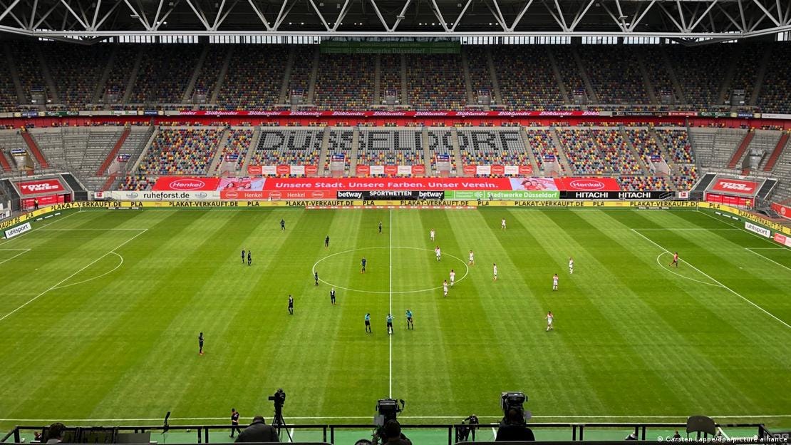 A view of the field at the Fortuna Düsseldorf stadium with the worlds Düsselforf shown the background