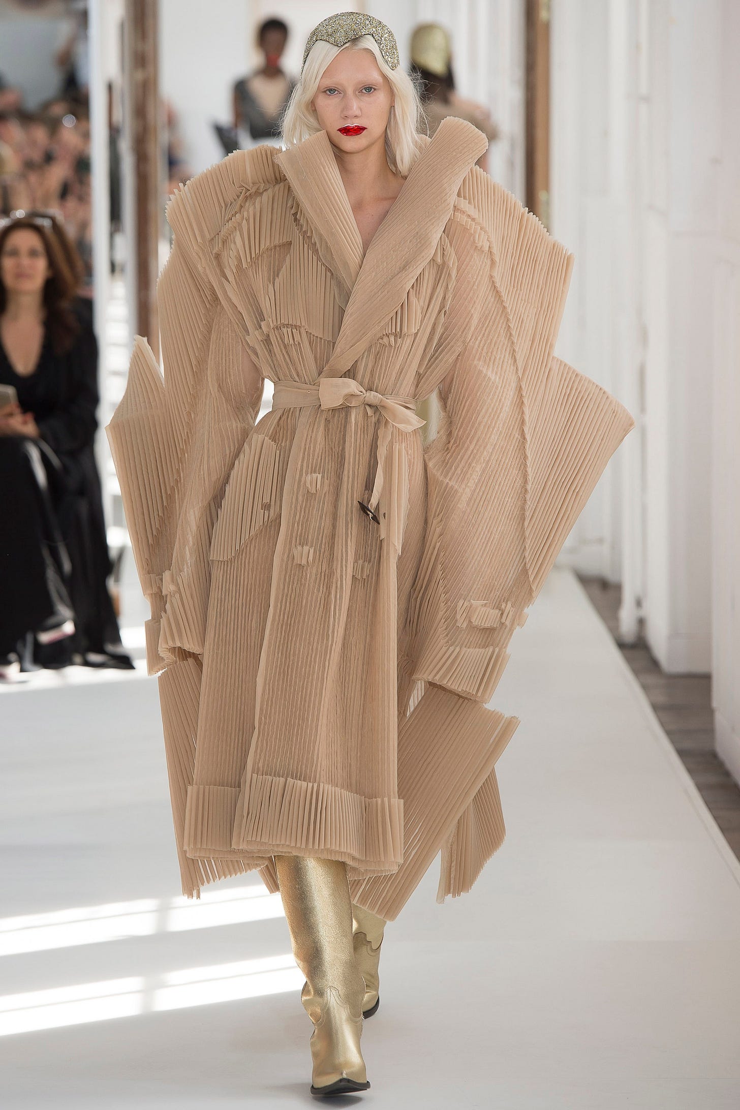 Image may contain Clothing Apparel Coat Human Person Fashion and Sleeve