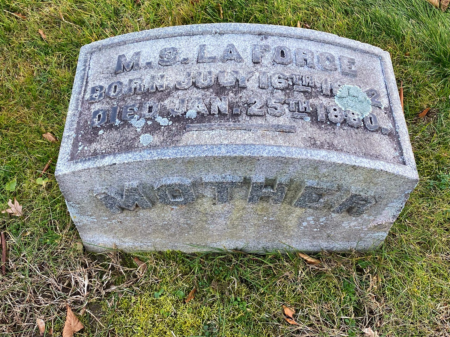 An older headstone engraved M.S. LaForge on the top and "Mother" on the front.
