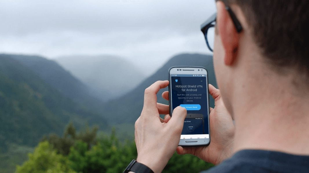 hotspot shield with man outside using wifi