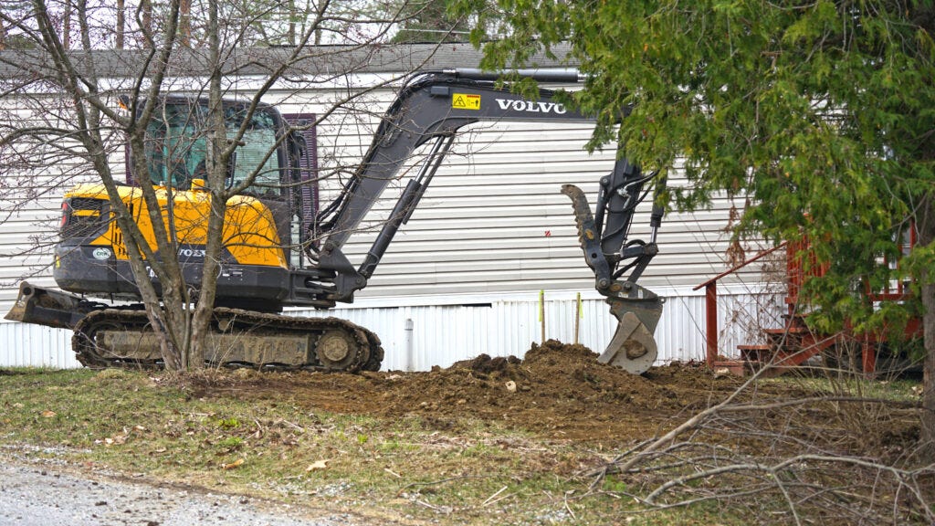 Workers finish up fixing a second water leak at Sunset Lake mobile home community in April. At one point 7,000 gallons a day were leaking within the community of 55 homes. Workers finish up fixing a second water leak at Sunset Lake mobile home community in April. At one point 7,000 gallons a day were leaking within the community of 55 homes.