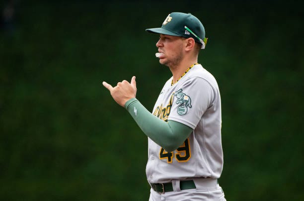 Ryan Noda of the Oakland Athletics gestures in the third inning of the game against the Minnesota Twins at Target Field on September 28, 2023 in...