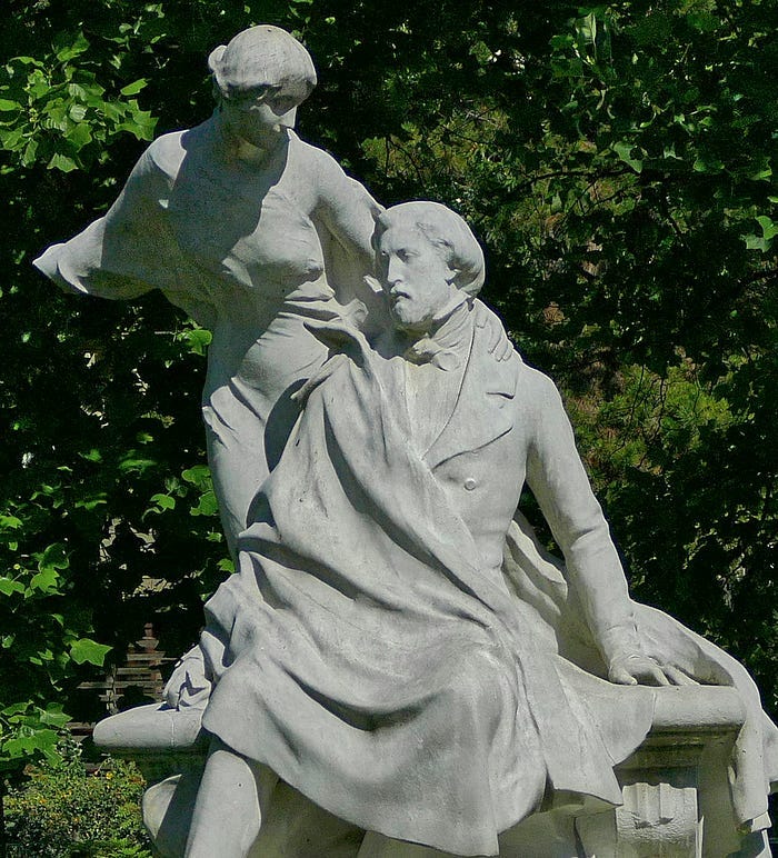 Statue of the writer and his Muse.