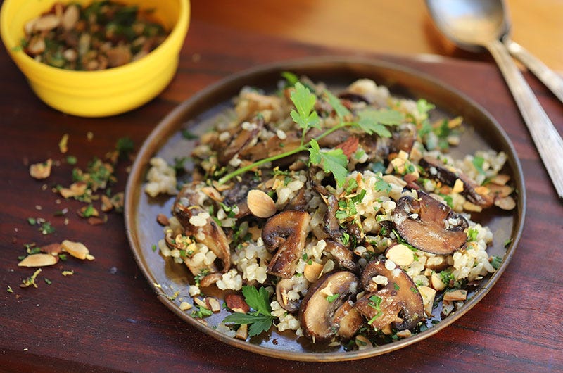 A Mushroom Melange with Short Grain Brown Rice, Parmigiano, Lemon, Parsley, and Toasted Almonds, Cook the Vineyard