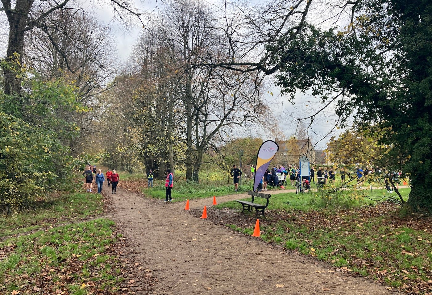 The finish area is visible just after an intersection of mud paths