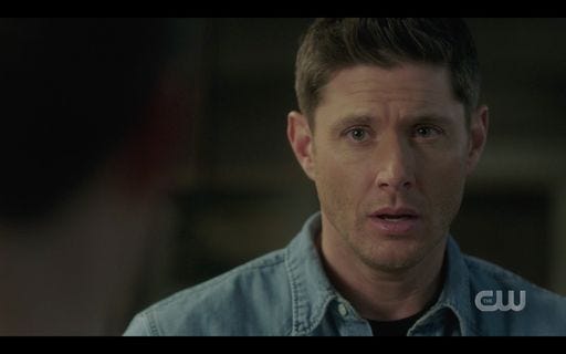 Dean Winchester looking at Jack worried about Sam.