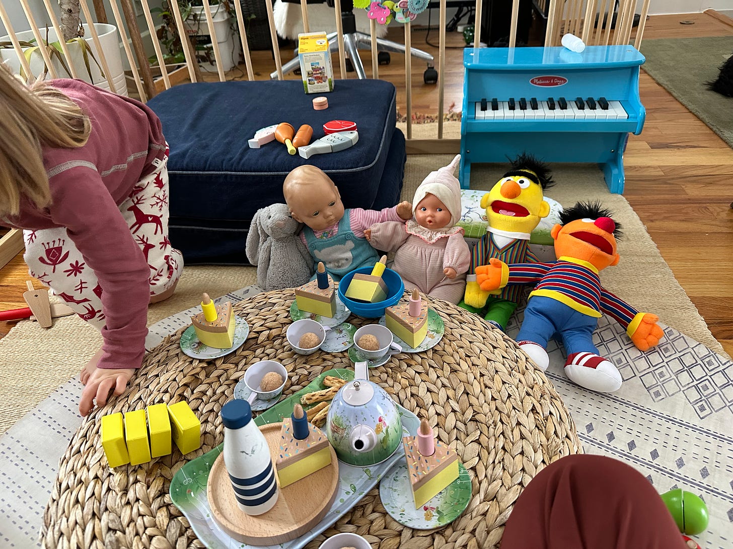 Toddler tea party with her stuffed animals