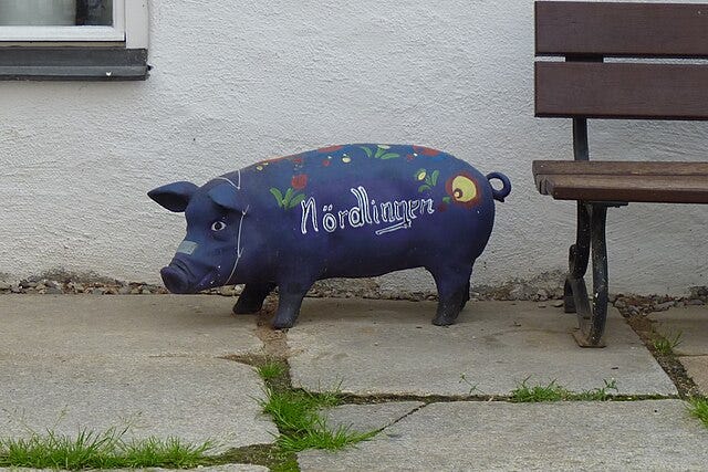 A photo of a pig statue found in the present-day city of Nördlingen