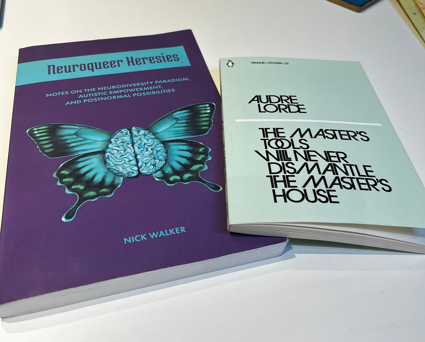 Copies of the Books 'Neuroqueer Heresies' by Nick walker and 'The Master's Tolls will Never Dismantle the Master's House' by Audre Lorde on a white table