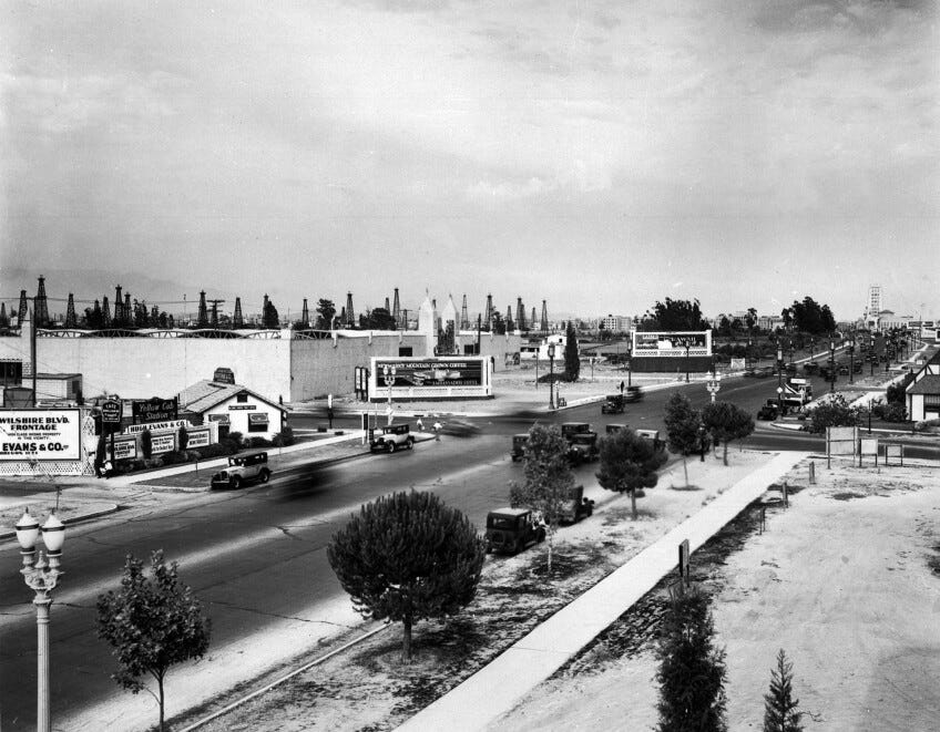 Circa 1929 view of the Miracle Mile, looking east down Wilshire from Fairfax. Courtesy of the Title Insurance and Trust / C.C. Pierce Photography Collection, USC Libraries.
