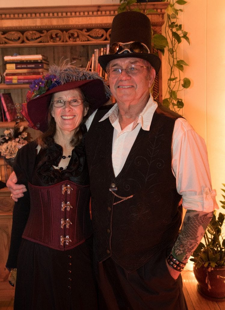 Chelsea's parents rocking it. Notice Steve's full-sleeve tattoos and Linda's amazing corset.