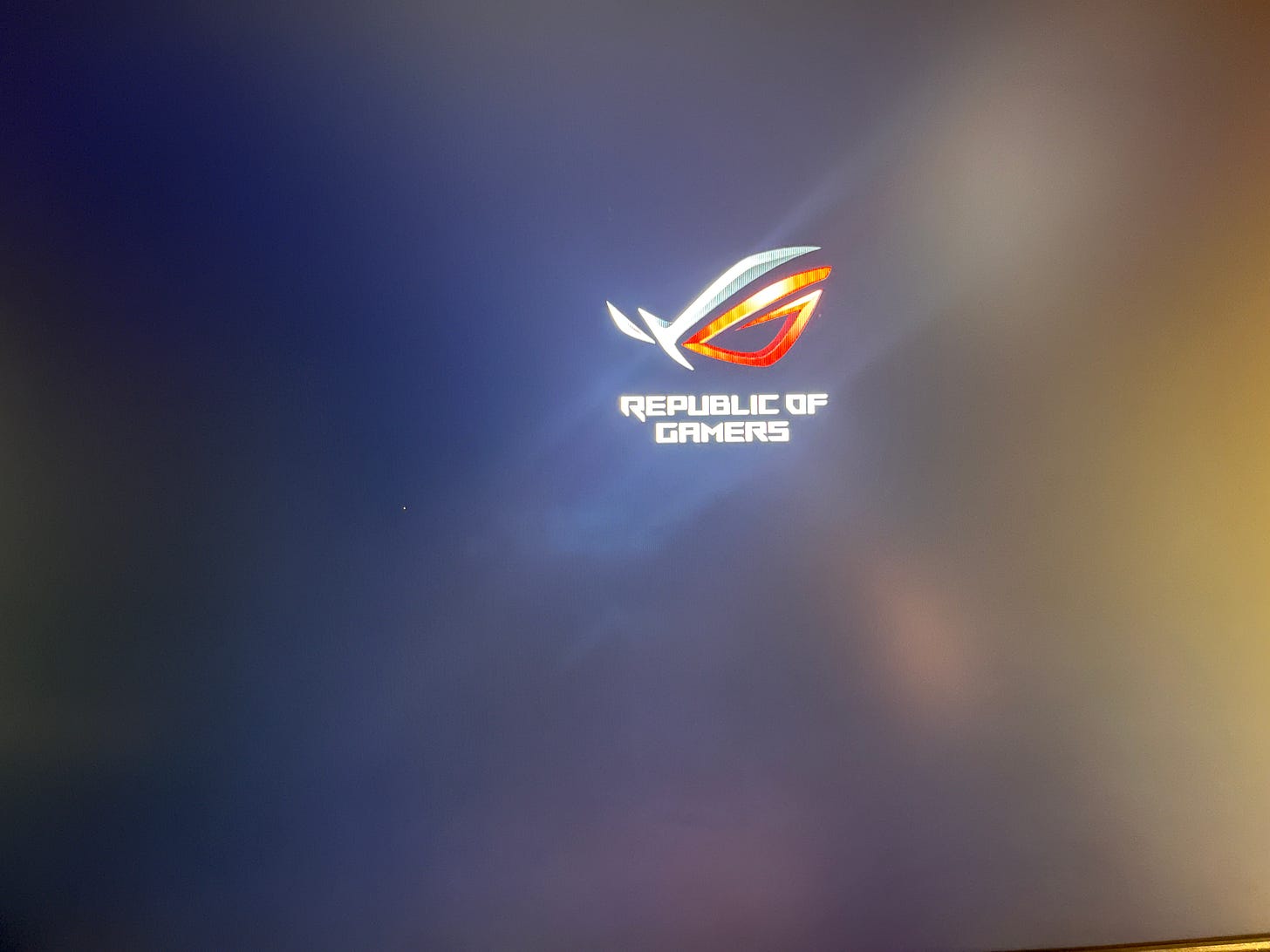 Republic of Gamers logo on a mostly black screen