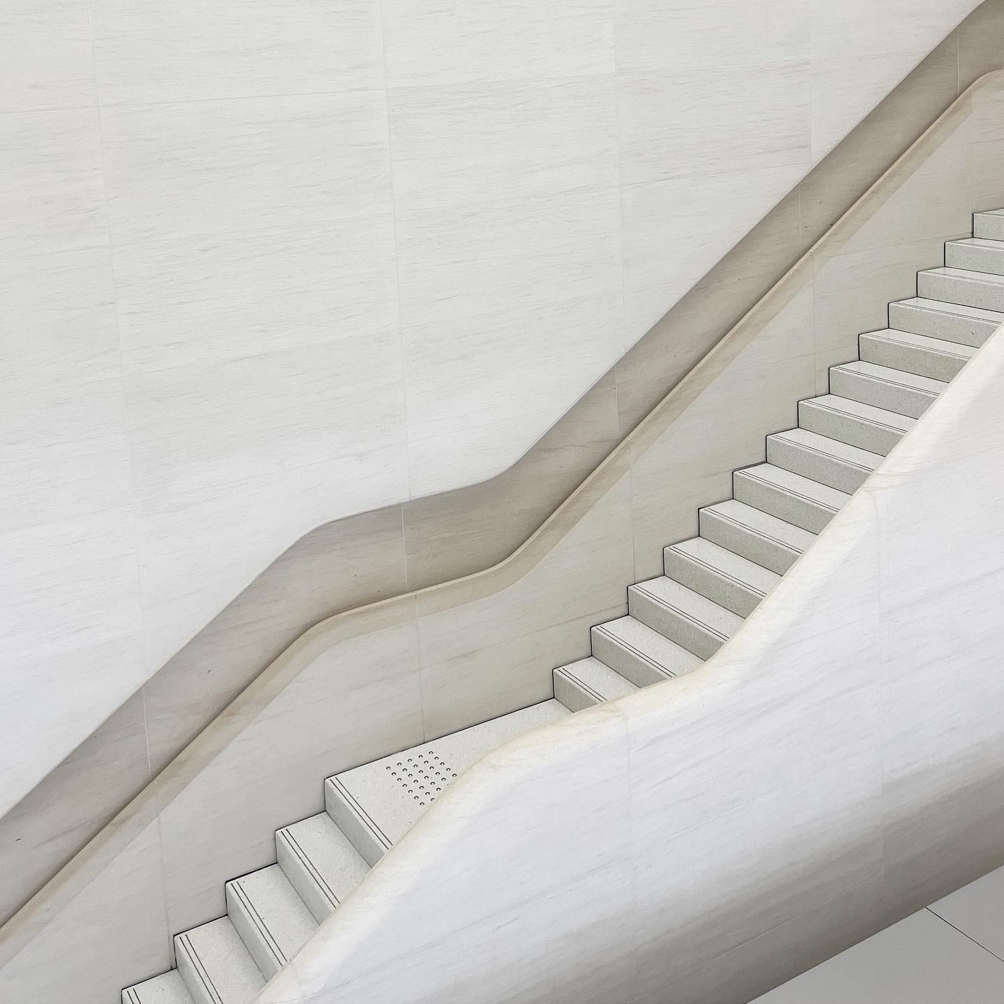 The sculptural stone staircase at Apple Kyoto.