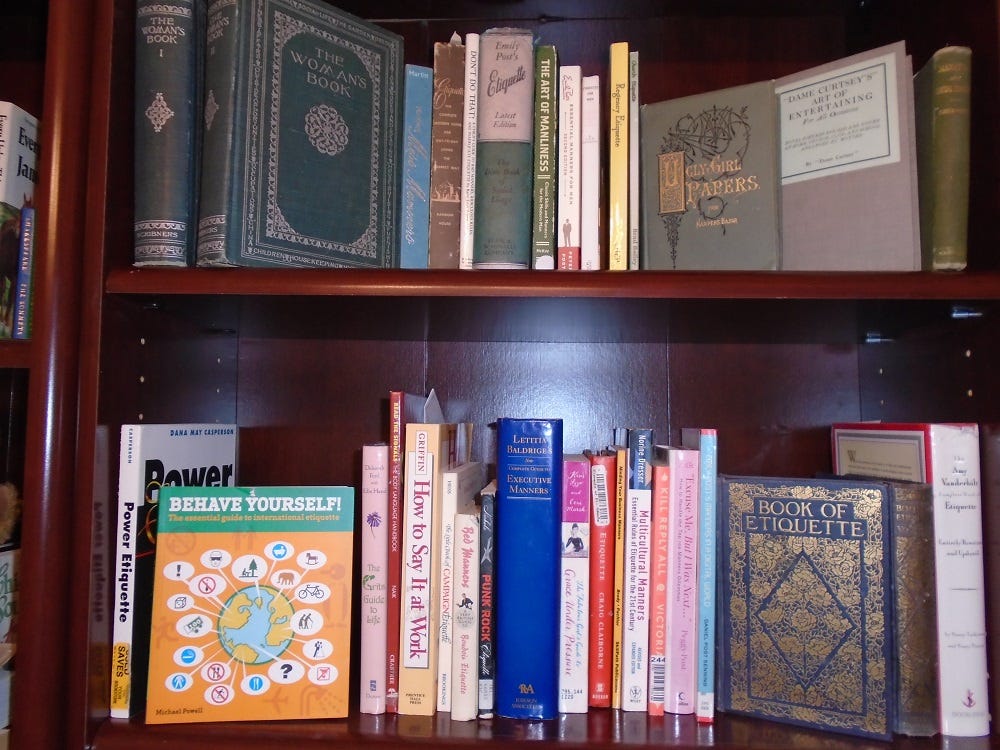 Lucinda Geritz's collection of new and old etiquette manuals on a bookcase.