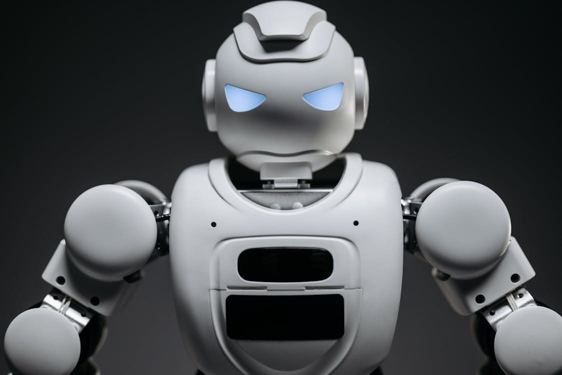 Free Close Up Shot of White Robot Toy Stock Photo