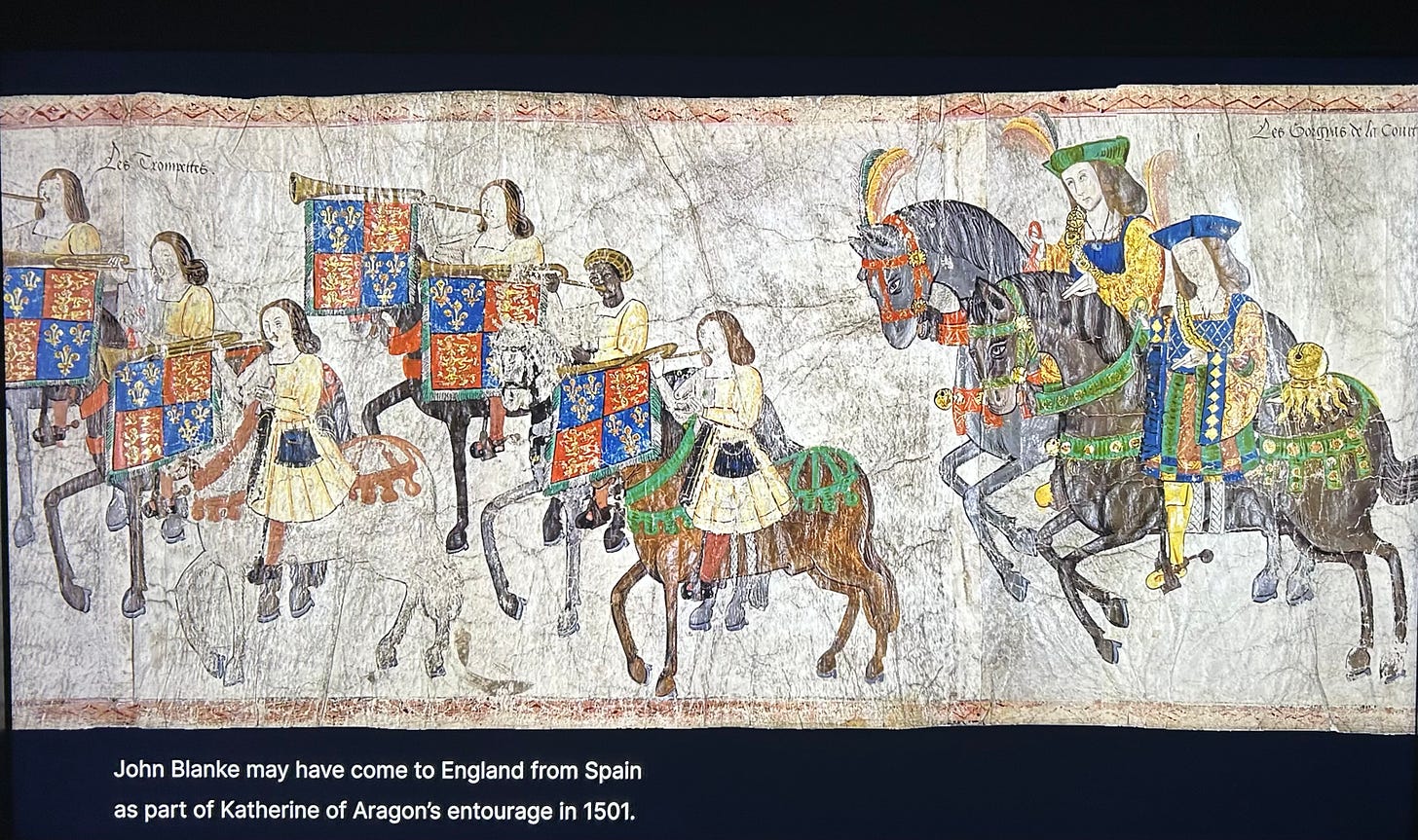 An extract from a long roll showing 8 men on horseback. 6 are trumpeters, and one has been identified as the trumpeter John Blanke.