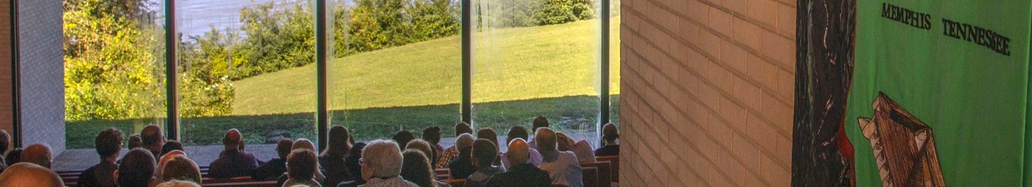 Members of the First Unitarian Church of Memphis – Church of the River looking out their church window at the Mississippi River.