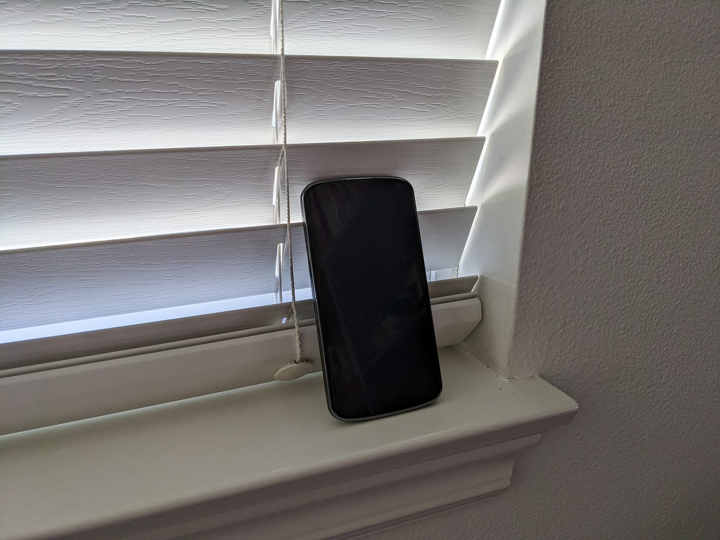 picture of google nexus phone by window