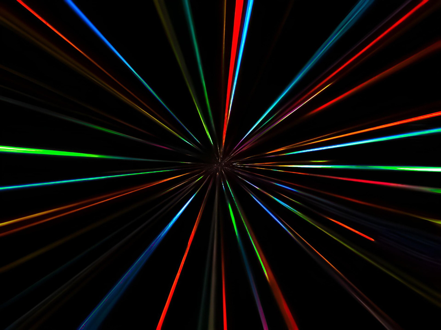 colorful laser beams converging on black background