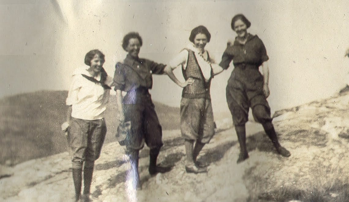 four woman on mountain