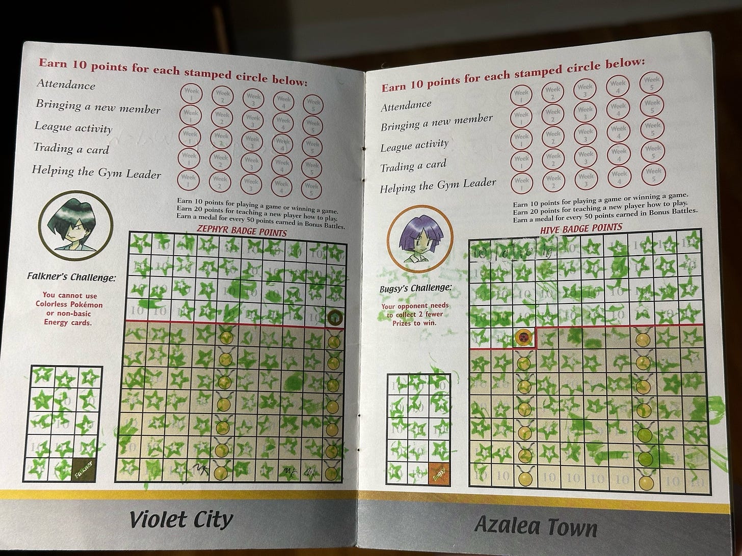 Inside Greg's badge book, showing stamps for Falkner & Bugsy's Challenges