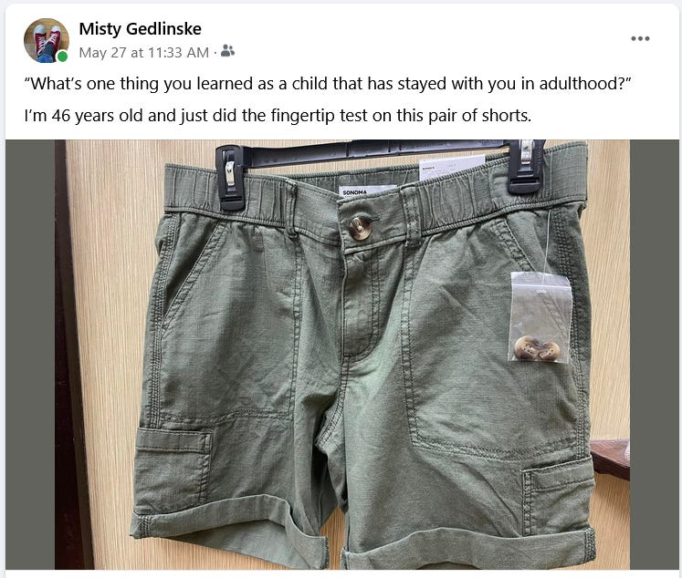 A screenshot of a Facebook post by Misty Gedlinske, dated May 27, 2023 at 11:33 AM. It is am image of olive green cargo shorts on a black plastic clip-style clothes hanger, captioned "What's one thing you learned as a child that has stayed with you in adulthood?" "I'm 46 years old and just did the fingertip test on this pair of shorts."