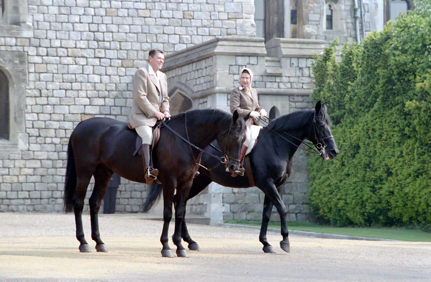 Ronald Reagan and Queen Elizabeth horseriding at Windsor Castle