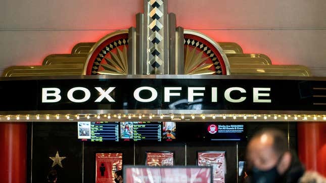 A guest purchases a ticket in front of a box office at AMC movie theater in Lincoln Square, amid the coronavirus disease (COVID-19) pandemic, in the Manhattan borough of New York City, New York, U.S., March 6, 2021. 